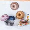 KARACA CAKE PRO Moule en fonte rose-gold KARACA CAKE PRO Dilimli Rosegold döküm kek kalıbı KARACA CAKE PRO Rosegold Gusseiserne kuchenform mit ensätzen