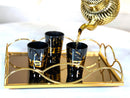 Set aus 12 Schwarzteegläsern mit dickem Goldrand